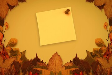 Autumn leaves with yellow note