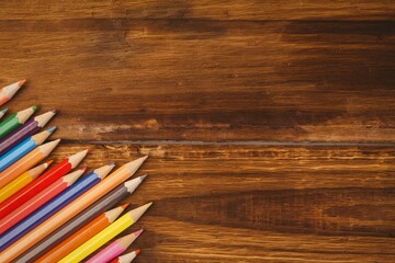 Color pencils on wooden table