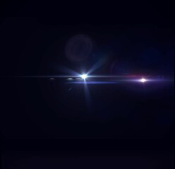 Glowing lens flare against black background