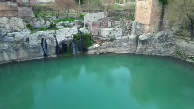 Aerial view of natural pool surrounded by rocks, Pakistan.