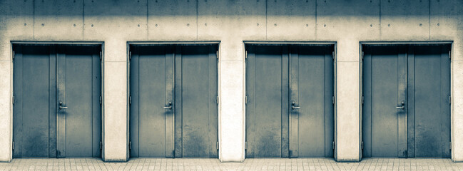 Closed steel doors of warehouse, storage or storefront for metal door background banner template.