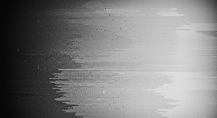 Old movie frame texture in grayscale with noise distortion, used in analog film emulation for editorial and branding