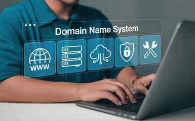 Domain name system icons displayed over a person using a laptop computer.