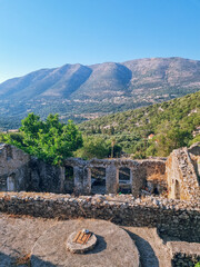 Houses ruines in Drakopoulata, abandonned village in Kefalonia after an earthquake with a panoramic...