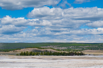 Expansive Yellowstone Plains Under Dramatic Cloudscape