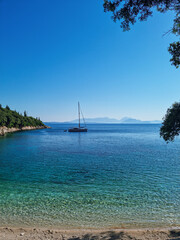 Panoramic view over Kourvoulia Beach, popular beach near Frikes and Kioni with blue turquoise...