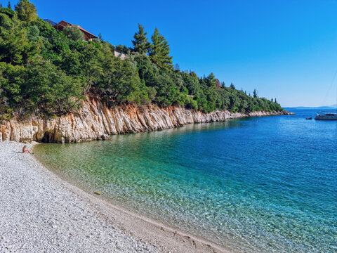 Panoramic view over Kourvoulia Beach, popular beach near Frikes and Kioni with blue turquoise waters, Ithaca island, Greece