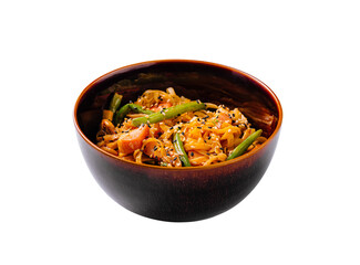 Asian-style noodles with vegetables, sesame seeds, and a savory sauce served in a rustic dark bowl. Flavorful and colorful noodle dish.