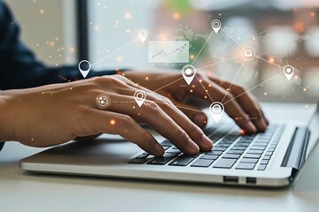 Typing on Laptop with Location Icons Connecting Digitally to the World