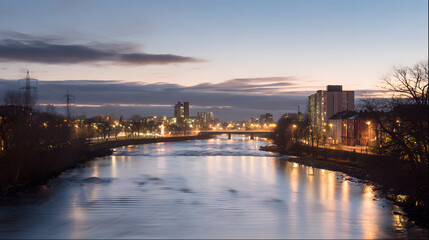 Twilight serenity by the urban river, where water mirrors the fading day