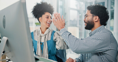 Computer, high five and success with business people in office together for goals or target. Bonus, celebration or milestone with man and woman employee in workplace for achievement or motivation