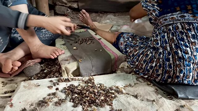 separating the skin of the melinjo fruit, the process of making emping chips