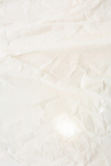 old crumbled paper with lights and shadows, texture background