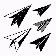 Black and gray paper airplanes in flight origami travel