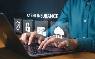 Cyber insurance represented with security icons and a person typing on a laptop.