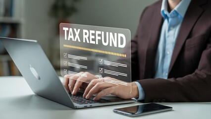 Online tax refund process with a laptop for financial services and businesses