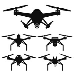 Five black drone silhouettes from different angles