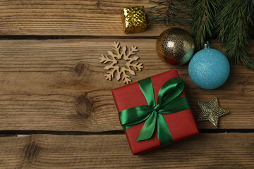 Gift boxes, New Year toys, New Year tree on wooden background