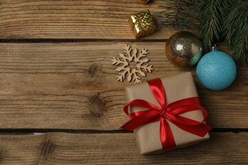 Gift boxes, New Year toys, New Year tree on wooden background