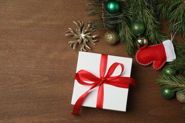 Gift boxes, New Year toys, New Year tree on wooden background