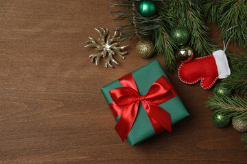 Gift boxes, New Year toys, New Year tree on wooden background