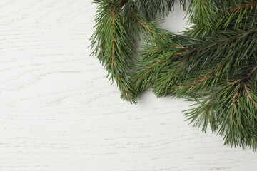 Gift boxes, New Year toys, New Year tree on white wood