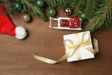 Gift boxes, New Year toys, New Year tree on wooden background
