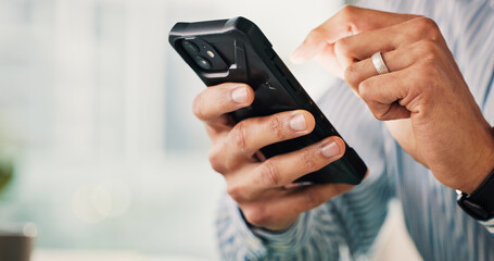 Business person, hands and research with phone in office for social media, software or update....