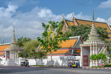 Tuk Tuk parking on the roadside near Wat Pho temple. Bangkok, Thailand