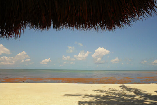 View from beneath tiki hut vibrant water and sky Florida Keys re