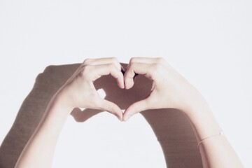 Heart-Shaped Hands - A Universal Gesture of Love and Connection