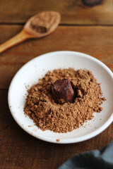 Truffle candy in a plate on the table