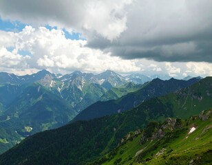 Fototapeta premium Time-lapse clouds over impressive mountain landscape scenery