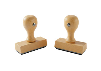 Two traditional wooden rubber stamps, rectangular and round, light natural wood with visible grain and matte black rubber pads, against a clean transparent background with strong studio shadows