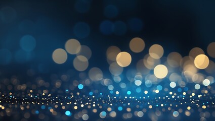 Abstract background with blurred golden and blue bokeh lights and sparkling particles on a dark background