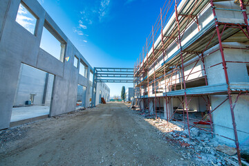 Early Construction Phase with Workers and Equipment on Site