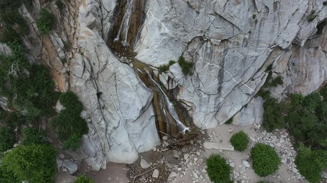 Aerial granite mountain waterfall forest canyon Utah climb 1.  Wasatch Mountain Range central Utah, outside Salt Lake City, Utah. Winter summer recreation. Landscape scenic and rugged. Cliff.