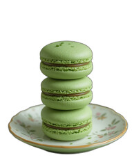 Delicious Green Macarons Stacked on a Floral Plate