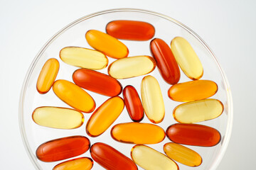 Vitamins capsules, fish oil, soft gels, supplements, omega 3, omega 9, vitamin D, vitamin E