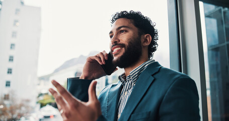 Happy, businessman and consultant with phone call in office for finance discussion or negotiation....