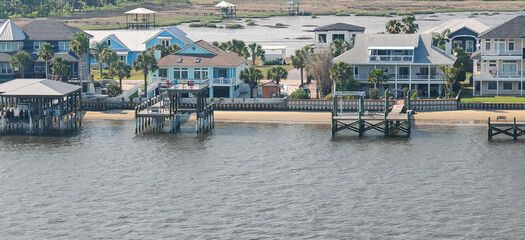modern villas in the river before entering in jacksonville harbour
