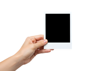 Hand holding blank photo frame, A hand holds a polaroid picture isolated on white or transparent background. PNG