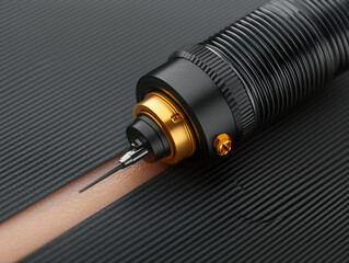Close up shot of tattoo machine needle with black and gold metal parts, detailed texture, modern design, and professional equipment for body art