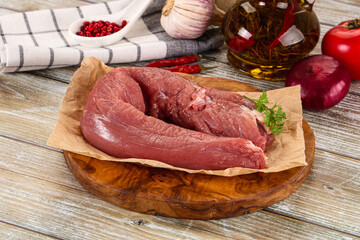 Raw pork tenderloin for cooking