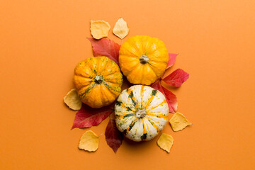 Autumn composition. Pattern made of dried leaves and other design accessories on table. Flat lay,...