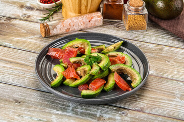 Salad with avocado and salmon