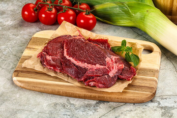 Raw beef cheeks cut for cooking