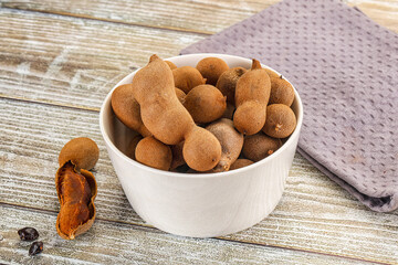 Tropical exotic Tamarind fruit heap