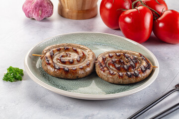 Grilled beef round circle sausages