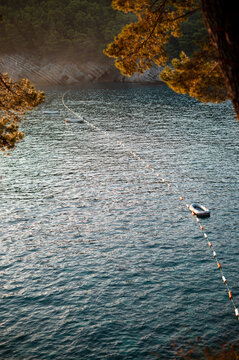 Serene Coastal Scene with Moored Boat